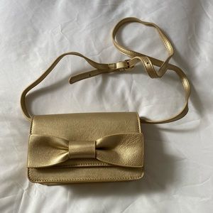 Gold bow crossbody